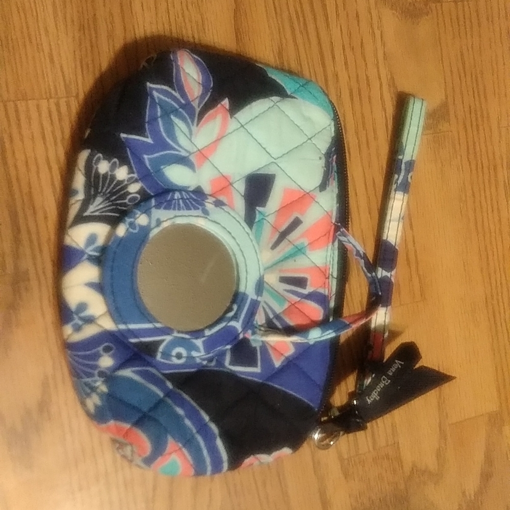 Small cosmetic wristlet with mirror